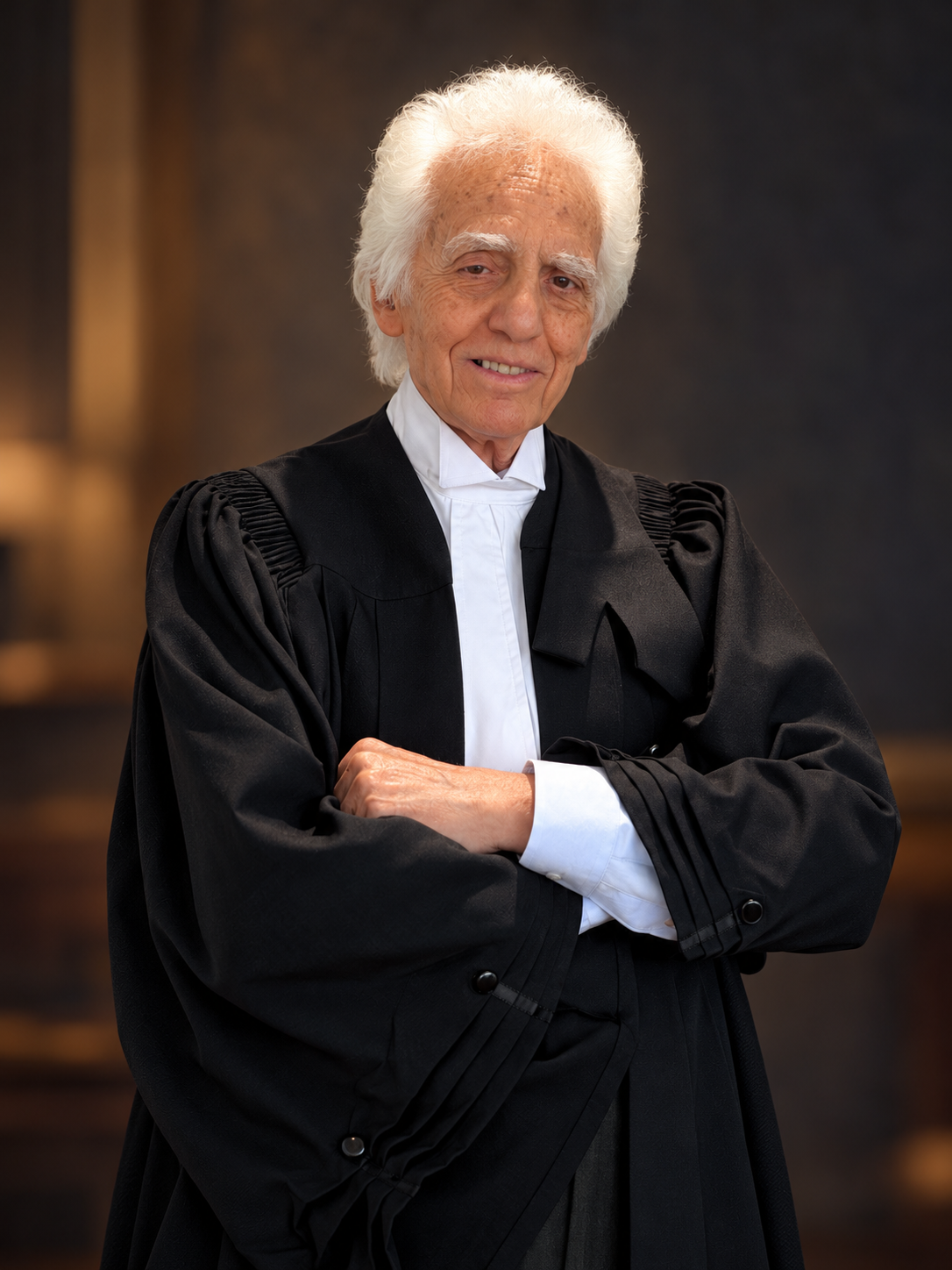 John Faraci wearing black barrister's robes and white neck tabs